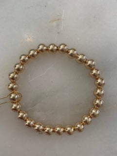 
            
                Load image into Gallery viewer, Classic Gold 7mm Bead Bracelet
            
        
